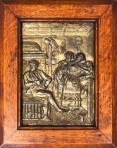 A metal relief plaque depicting a tavern scene, 21x15cm, in an oak frame