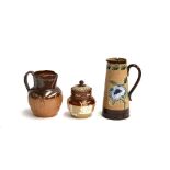 A Doulton Lambeth jug and lidded pot depicting tavern and hunt scenes; and a Doulton Lambeth