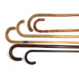 Six various walking sticks, two with silver mounts (6)