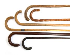 Six various walking sticks, two with silver mounts (6)