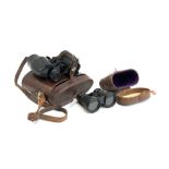 A pair of Solaross 9x35 binoculars in hard case, together with a further small pair of binoculars in
