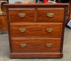 A late 19th/early 20th century chest of two short over two long drawers made by James Shoolbred,