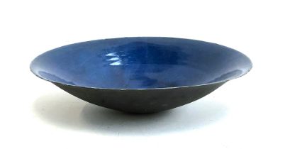 A deep blue studio pottery bowl, 42cm diameter, with mark to base