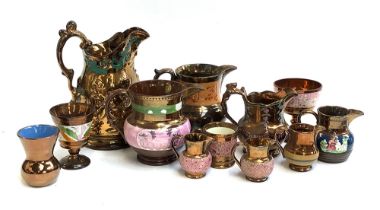 12 pieces of lustreware, to include Sunderlandware and other jugs, chalice, small vase, etc (12)