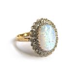 A 9ct gold opalite and diamond cluster ring, size Q, 4.8g
