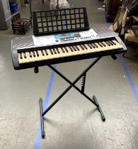 A Yamaha keyboard PSR-225GM, X-frame stand & music stand