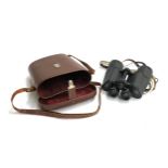 A pair of Karl Zeiss Jena dekarem 10x50 binoculars with leather case