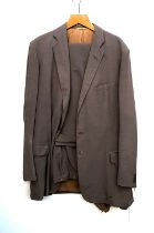 A Denman & Goddard brown cotton suit, c.1961, the trousers double pelated with tunnel top, 1.5"