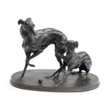 After Pierre-Jules Mene (French, 1810-1894), a patinated bronze figure group of two whippets, on