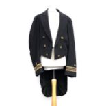 An American Naval uniform from the Officers Uniform Shop Naval Supply Depot Brooklyn New York;