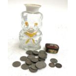 A small quantity of coins to include threepence 1887, 1902, sixpence 1939, in novelty glass piggy
