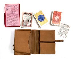 A Royal Auction bridge set in a leather wallet