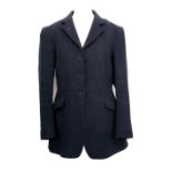 A Saddlemaster ladies navy wool hunting coat with tattersall wool check lining, size 36