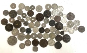 A quantity of silver and other coins to include 10 pfennig 1874, 20 francs 1934, 1 franc 1912, 1914,