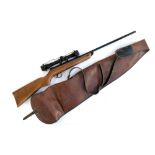 A BSA Meteor break action air rifle with Nikko Stirling Mountmaster 4x32 sight and gun slip