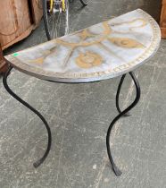 A contemporary silver and gilt gesso demilune table, on three wrought iron legs, 83cmW