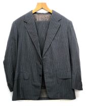 An Anderson & Sheppard two piece lightweight grey pinstripe single breasted suit c.1980, the