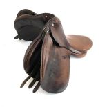 An Ideal GP 14.5" leather child's saddle
