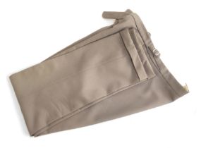 A pair of brown cavalry twill trousers, with button fly, side fastening and turnups, made by the