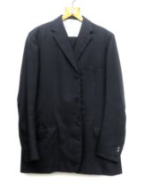A Denman & Goddard single breasted charcoal grey wool suit c.1968, approx. 40" waist, 34" inside