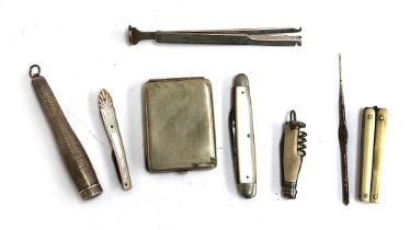 A mixed lot to include a sterling silver cheroot holder with engine turned design; match holder;