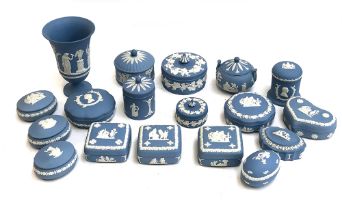 A collection of Wedgwood Jasperware lidded trinket pots (17), and a vase