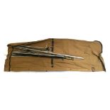 A vintage canvas and leather rod bag, containing a large quantity of bank sticks