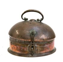 An Indian circular brass spice box, with domed lid, the interior having six pots, 33cmD