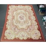 A large floral wool rug, approx. 272x174cm