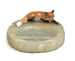An onyx pin dish with ceramic recumbent fox, the fox approx. 11cm long