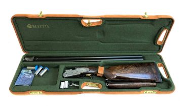 A Beretta 12 bore over and under shotgun, model 687EELL, 28" barrels, 2 3/4" chokes, gold-washed