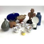 A mixed box of ceramics inc. studio pottery; South American figure of man and animal; tea cups &