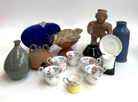 A mixed box of ceramics inc. studio pottery; South American figure of man and animal; tea cups &