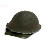A large WW2 military helmet