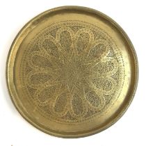 A late 19th/early 20th century Eastern worked brass tray, 39.5cmD