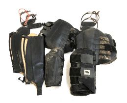 Four pairs of Woof boots; together with two pairs of stirrup irons, black leather half chaps