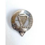 A Scottish silver Clan Rose brooch, bearing the motto 'Constant and True' and a harp crest, hallmark