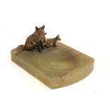 An onyx pin dish with cold painted bronze vixen seated and two cubs