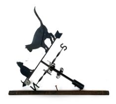 A large wrought iron weathervane with two cats, approx. 85cm wide