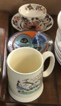 A small lot of ceramics to include a 20th century God Speed the Plough mug; studio pottery dish;