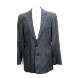 A single breasted grey pinstripe two piece suit, tailored by Ron Morley, 30" inside leg, approx.