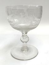 A 20th century hand blown glass goblet, engraved with hunting scenes, 16.5cmH