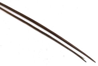 Two Aboriginal throwing spears, 140cm and 153cmL