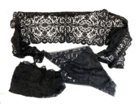 A black lace wrap; together with one other and a fichu (3)