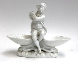 A blanc de chine figural salt, in the form of a piper, with blue underglaze Meissen crossed sword