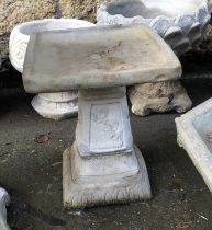 A composite stone bird bath with rose detail, 49cmH