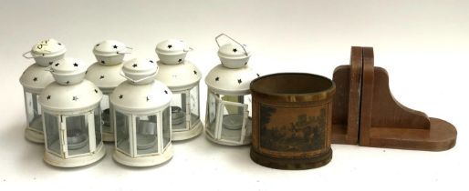 A set of six white painted metal lanterns; together with bookends etc