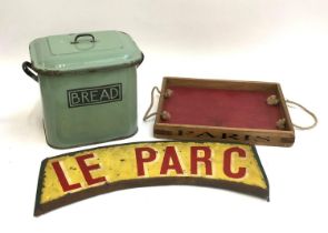A sage green enamel bread bin, a vintage French 'Le Park' sign, 59cmW; and a vintage style tray
