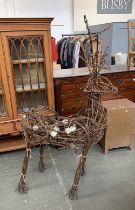 A wicker reindeer with fairy lights, 160cmH