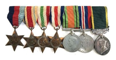 A group of seven medals comprising 1939-1945 Star, The Africa Star, The Italy Star, The France and